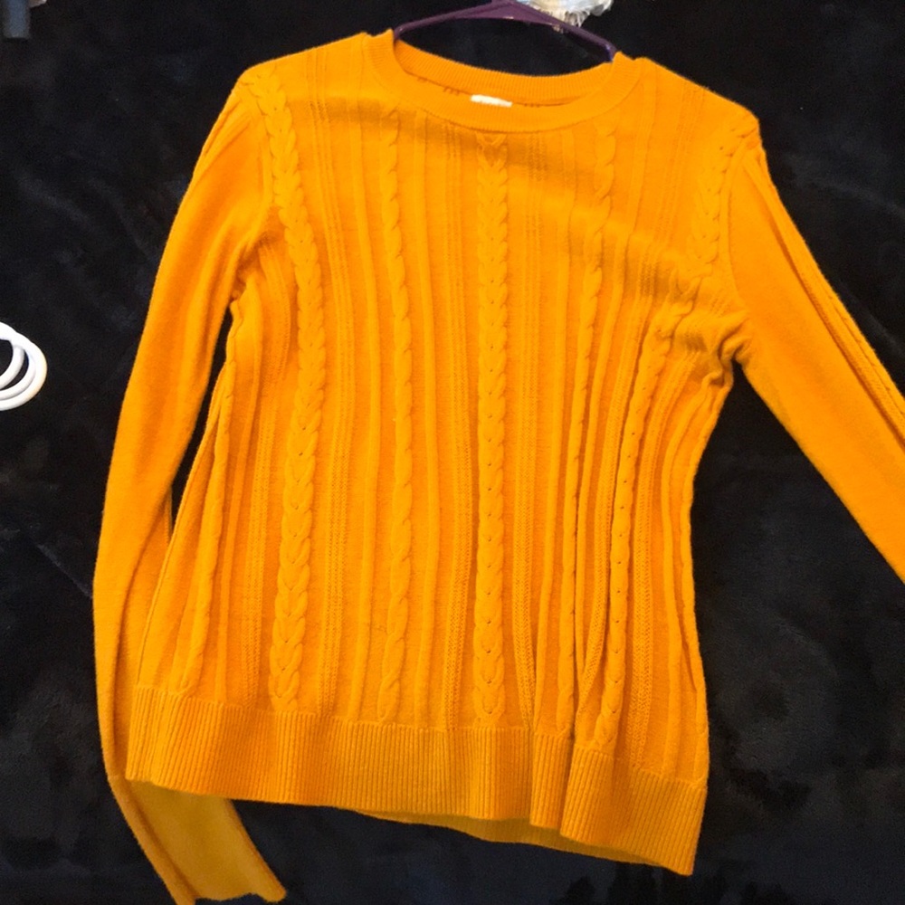 Cute yellowy-orange sweater perfect for fall!
